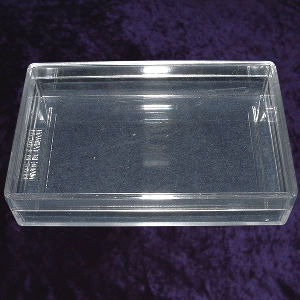 A clear plastic card box with lid for 57mm wide bridge cards